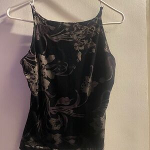 Small vintage tank top, not super cropped, very cute for summer.
